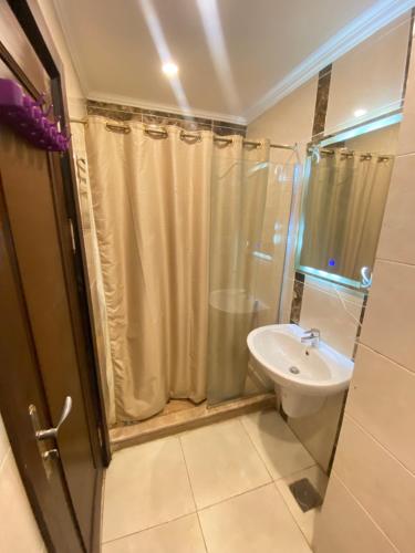 a bathroom with a shower and a sink at Apartment in El Alamein,Sia Lagoon,Golf porto marina in El Alamein