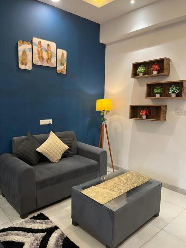 Ruang duduk di Coco Sunset View Suites
