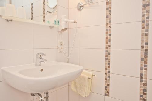 Koupelna v ubytování Frühstückshotel Landgasthof Kramer