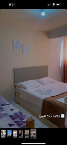 Una cama o camas en una habitación de Hotel Morada de Leste Pontal