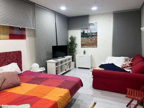 En eller flere senge i et værelse på App privado en casa, si mascotas