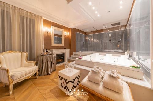 Koupelna v ubytování Tesoretto Hotel
