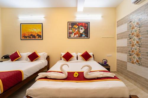 Varnam Private Pool Villa Pondicherryにあるベッド