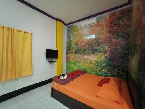 TV a/nebo společenská místnost v ubytování EMWEKA Pavillion Balikpapan
