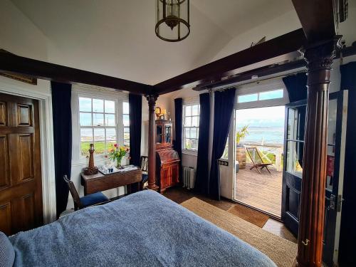 Katil atau katil-katil dalam bilik di The West Usk Lighthouse Lightkeepers Lodge