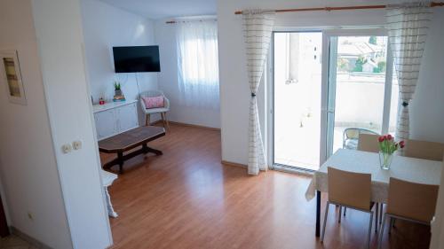 TV a/nebo společenská místnost v ubytování Apartman Marito