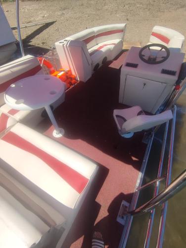 a view of the inside of a boat at Apartmani Damjan Vlasinsko jezero in Surdulica
