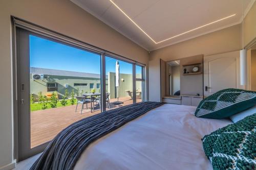 Кровать или кровати в номере Cottage 3 - Leo Sky Farm