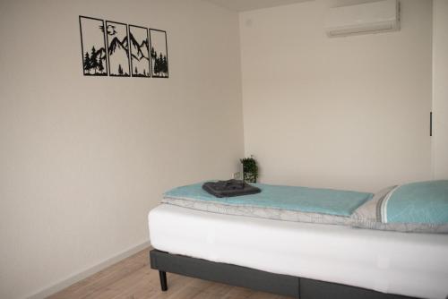 Ένα ή περισσότερα κρεβάτια σε δωμάτιο στο Ferienzimmer Albbruck
