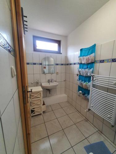 Koupelna v ubytování Casa-Dorina