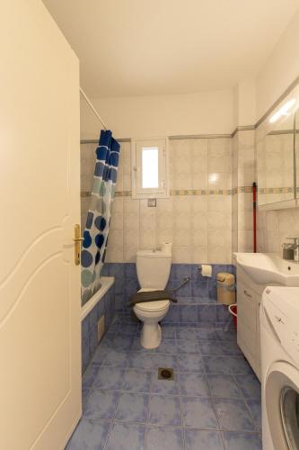 Ένα μπάνιο στο Toli apartments