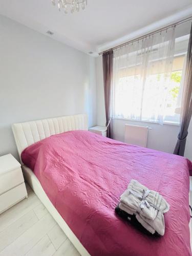 Ένα ή περισσότερα κρεβάτια σε δωμάτιο στο Luna Deluxe Magellana