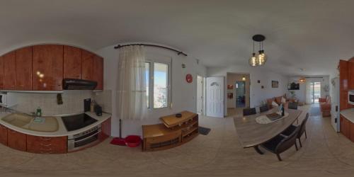 Η κουζίνα ή μικρή κουζίνα στο Toli apartments