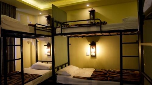 Postel nebo postele na pokoji v ubytování Rafiki Hostel