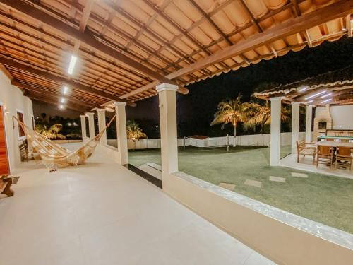 Πισίνα στο ή κοντά στο Linda Casa de Praia Família com até 10 pessoas