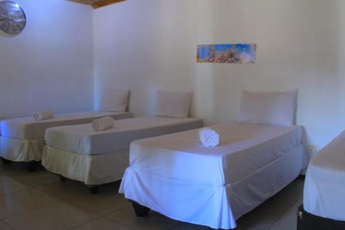 Postel nebo postele na pokoji v ubytování Creg Guest House Rustenburg