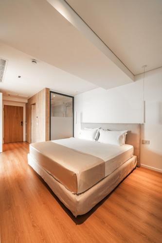 Postel nebo postele na pokoji v ubytování Hotel Vale