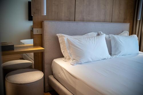 Postel nebo postele na pokoji v ubytování Hotel Vale