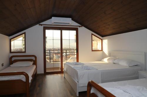 Ένα ή περισσότερα κρεβάτια σε δωμάτιο στο Heritage House Berat