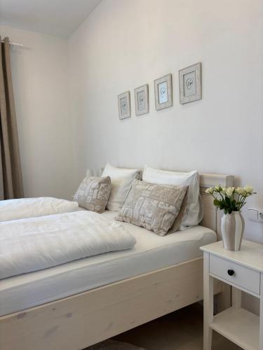 Postel nebo postele na pokoji v ubytování Vila Bílý Jelen apartments Ralsko