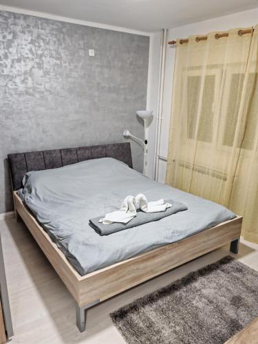 Postel nebo postele na pokoji v ubytování Stan na dan Smederevska palanka