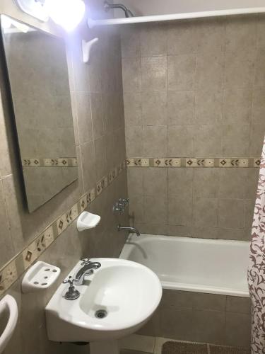 a bathroom with a sink and a bath tub at Carballo de Cereixo - Solo con seña in Federación