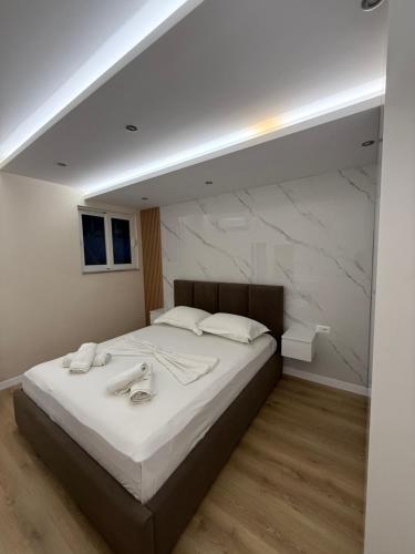 Ένα ή περισσότερα κρεβάτια σε δωμάτιο στο Almar apartaments