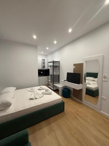 Ένα ή περισσότερα κρεβάτια σε δωμάτιο στο Almar apartaments
