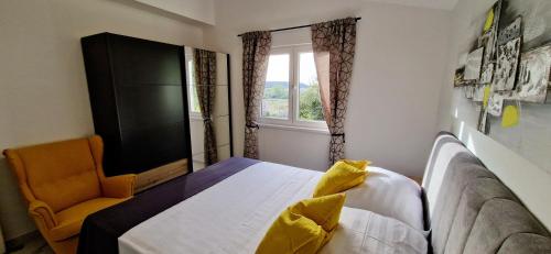 Postel nebo postele na pokoji v ubytování Apartments Davorka