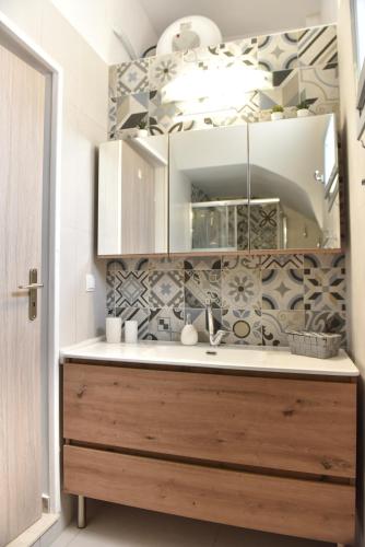 a kitchen with a sink and a counter top at Faros Anaplioti in Kalymnos