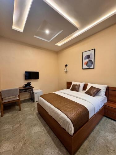 Postel nebo postele na pokoji v ubytování Cavan Hotels