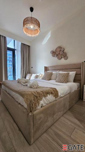 Postel nebo postele na pokoji v ubytování EGATE - Studio - 2nd Floor with Balcony - Dubai - 33-212