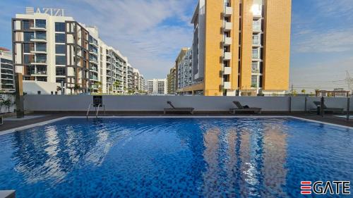 Bazén v ubytování EGATE - Studio - 2nd Floor with Balcony - Dubai - 33-212 nebo v jeho okolí