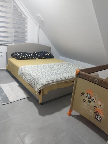 Cama o camas de una habitación en Apartmani Manić