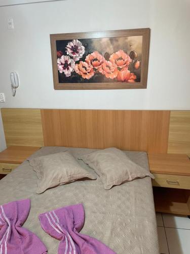 En eller flere senge i et værelse på Acqua City 2 Flats 703