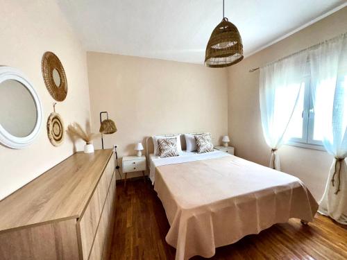 Ένα ή περισσότερα κρεβάτια σε δωμάτιο στο Villa Olea