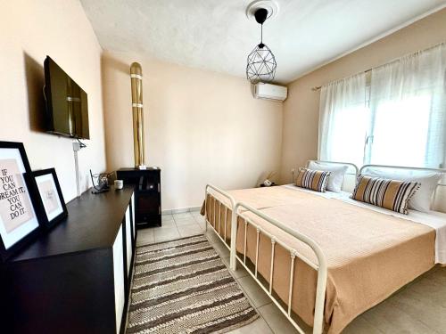 Postel nebo postele na pokoji v ubytování Villa Olea