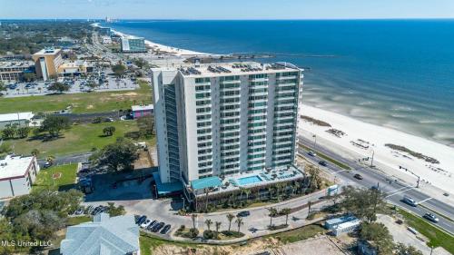 an aerial view of a tall building next to the beach at Ocean Club 1206 Premier in Biloxi
