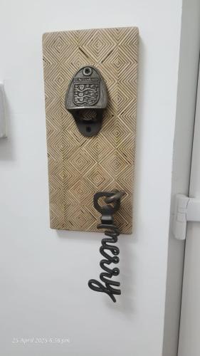 a door with a phone sticking out of it at Stylish 3-Bed house NEC-JLR-Airport-HS2-Driveway in Birmingham
