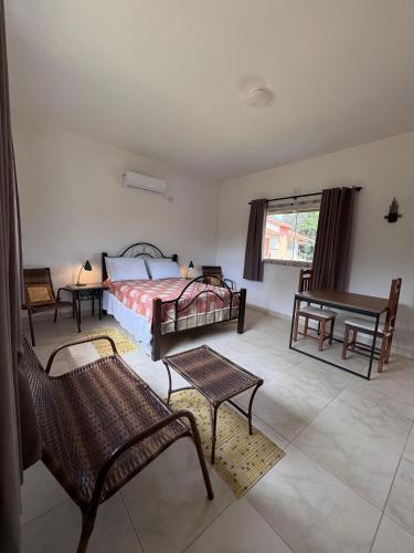 Ένα ή περισσότερα κρεβάτια σε δωμάτιο στο Tapuio Park Hotel