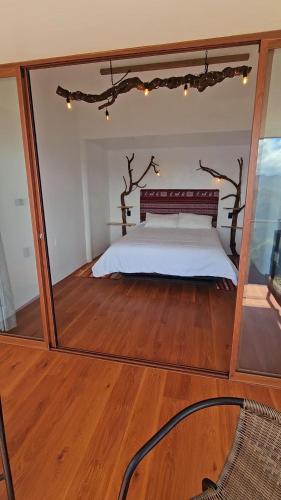 Ένα ή περισσότερα κρεβάτια σε δωμάτιο στο Pucara Lodge