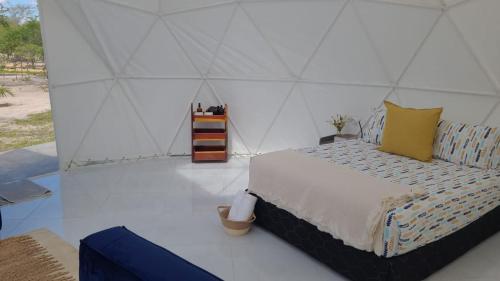 Giường trong phòng chung tại geo dome