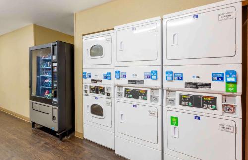 a bunch of machines lined up against a wall at Extended Stay America Suites - Billings - West End in Billings