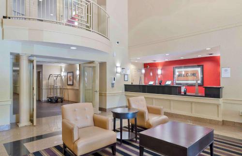 a lobby with a waiting area with chairs and a table at Extended Stay America - Atlanta - Marietta - Interstate N. Pkwy in Atlanta