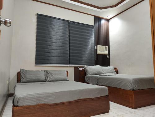 Giường trong phòng chung tại Bale DT