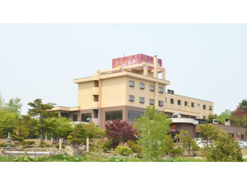 a building with avertisement at Hotel Hounomai Otofuke - Vacation STAY 29499v in Otofuke