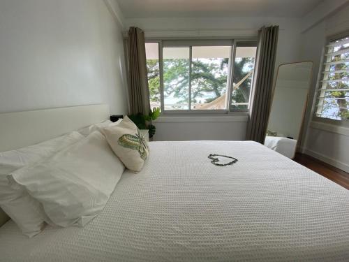 Postel nebo postele na pokoji v ubytování Waterfront modern 3br home Vale Ni Vonu