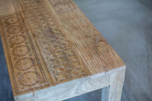 a close up of the top of a wooden table at Oceanview 3BR Villa with 3 Shared Pools and Beachfront Resort Access in Ocotal