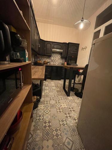 Kuchyň nebo kuchyňský kout v ubytování Maison chaleureuse Bassin d Arcachon