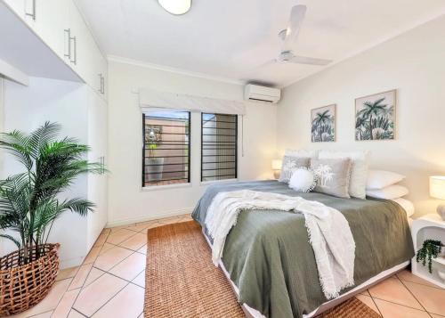 Ένα ή περισσότερα κρεβάτια σε δωμάτιο στο Tropical Dream Home